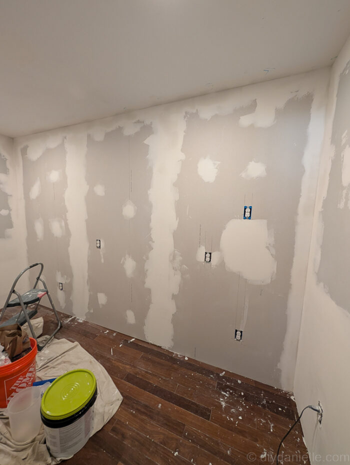 This is the pantry wall after mudding... I'm not sure how many layers of mud this was as the photos didn't really show a huge difference in my opinion. 