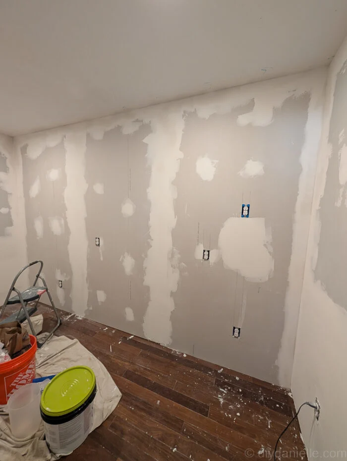 This is the pantry wall after mudding... I'm not sure how many layers of mud this was as the photos didn't really show a huge difference in my opinion.