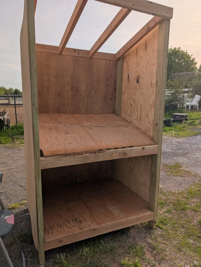Wood boards cut and ready to install as the countertop and bottom shelf for a DIY farm stand.