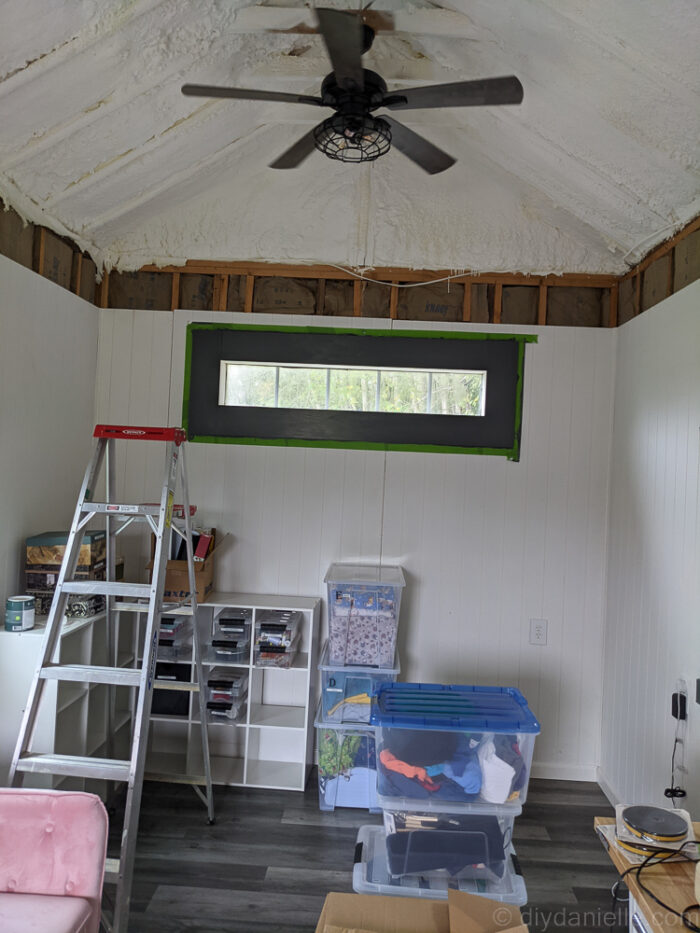 Empty wall space with window before loft and base cabinet build