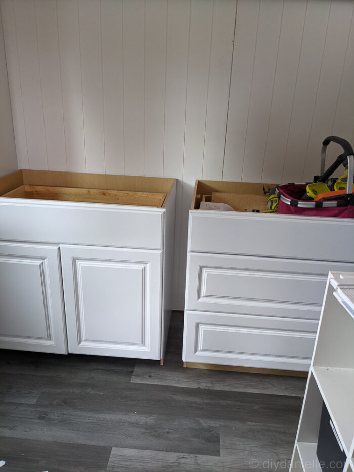 Small gap between kitchen cabinets used as pull-out storage