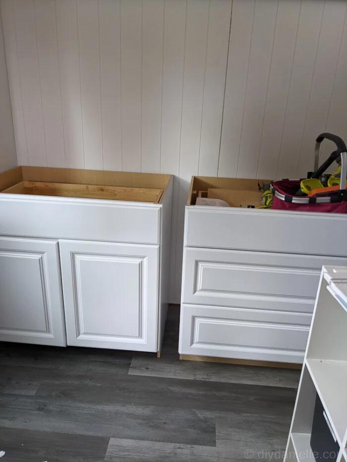 Small gap between kitchen cabinets used as pull-out storage