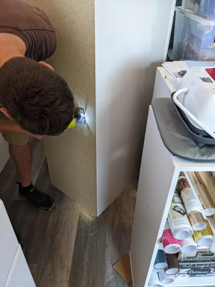 Cutting outlet hole in back of kitchen cabinet