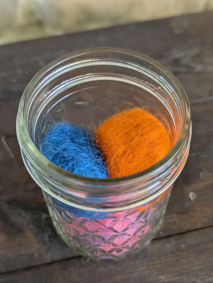 Close-up of freshly needle felted catnip balls before storage