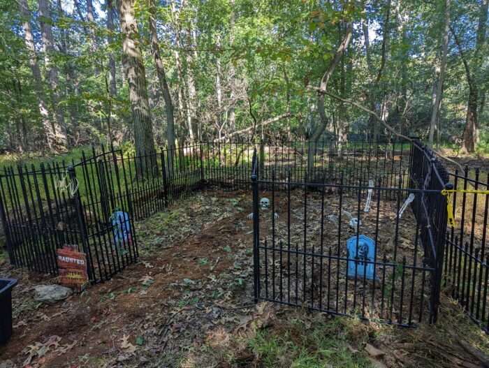 First-year Halloween graveyard setup with small fenced square, where kids could walk inside to get candy.
