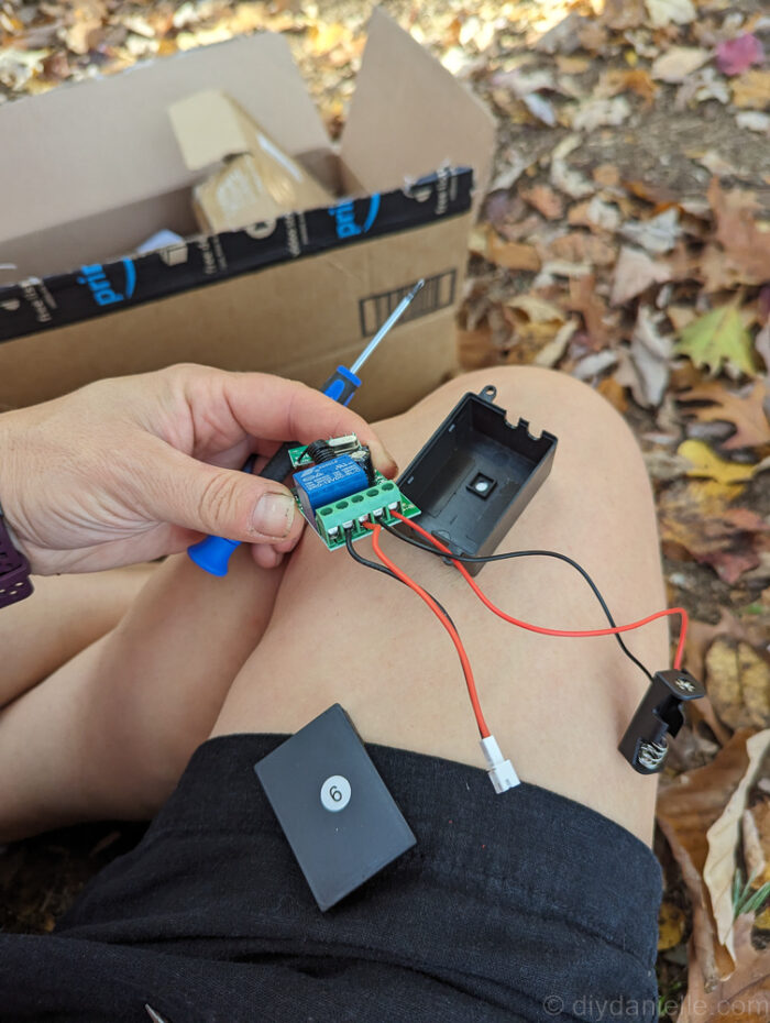 Numbered relay boxes for DIY Halloween animatronics, showing how labeling helps match each button to the correct prop.