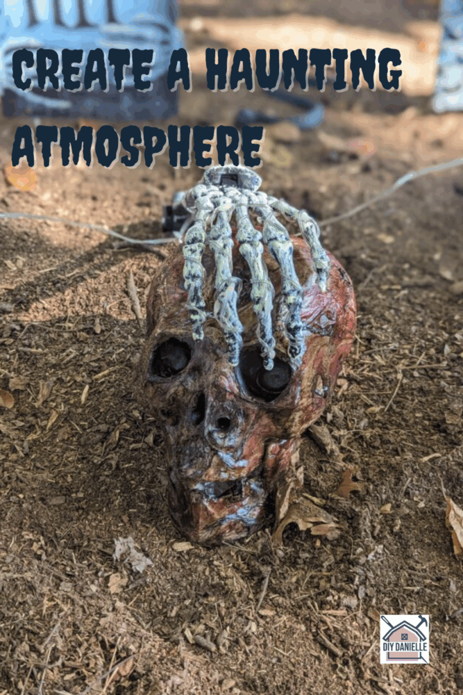 Eerie Halloween yard setup with props and lighting, creating a haunting atmosphere for trick-or-treaters.