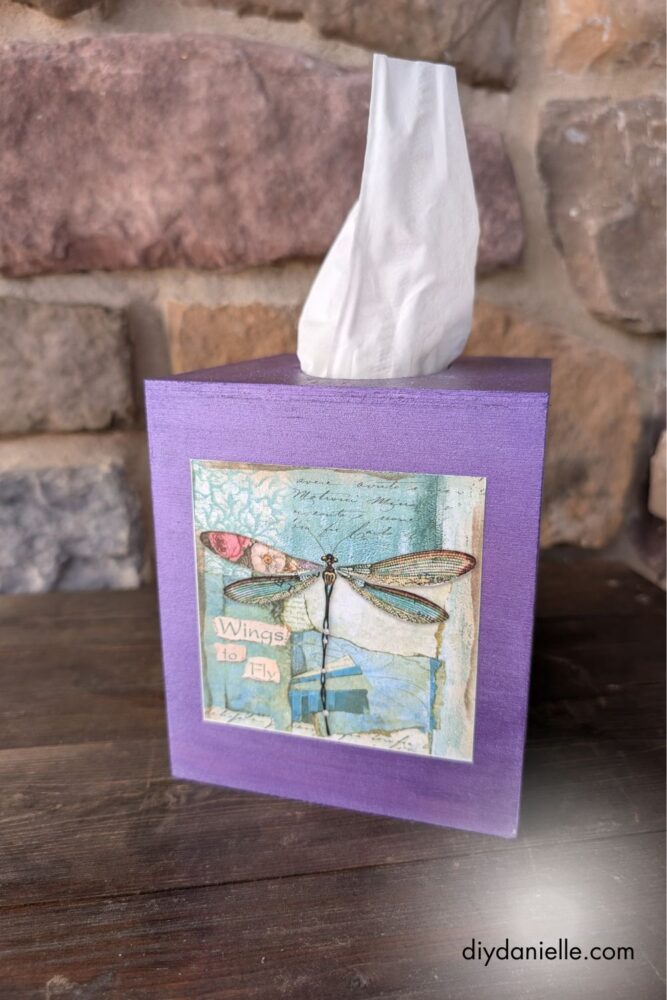  Hands holding various crafting materials to upcycle old notebooks, boxes, and more.