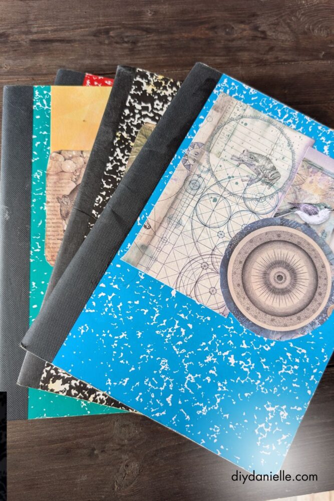 Finished DIY notebooks covered in decorative scrapbook paper for reuse.
