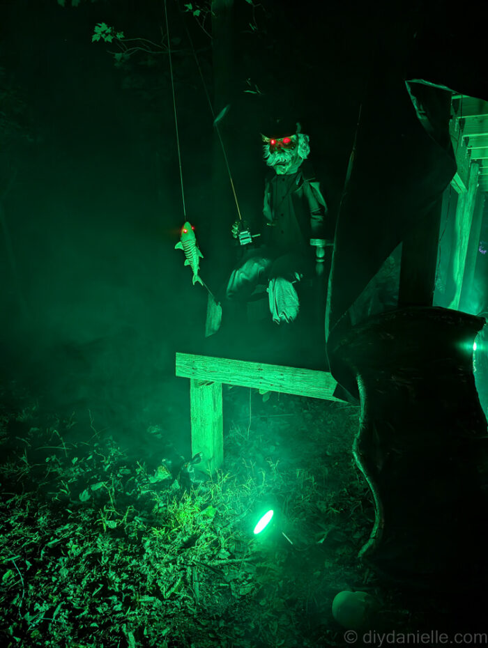 Final nighttime photos of the Halloween trail showing glowing decorations and spooky setups.