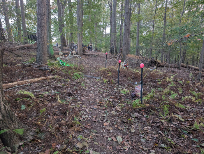 doll head lights line the pathway of Halloween trail