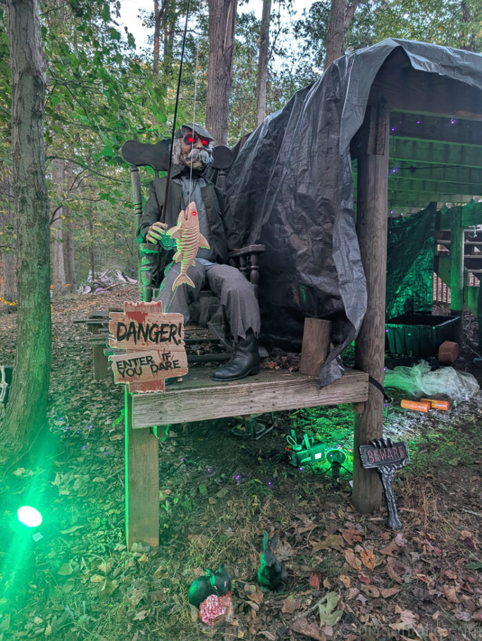 Halloween decorations set up for a large trail, intended for future reuse in smaller displays.