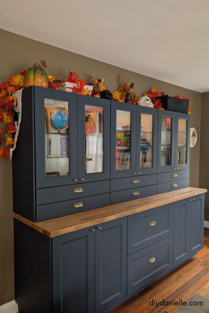 IKEA cabinets and countertop installed in a living room renovation, planned as a future built-in hutch.