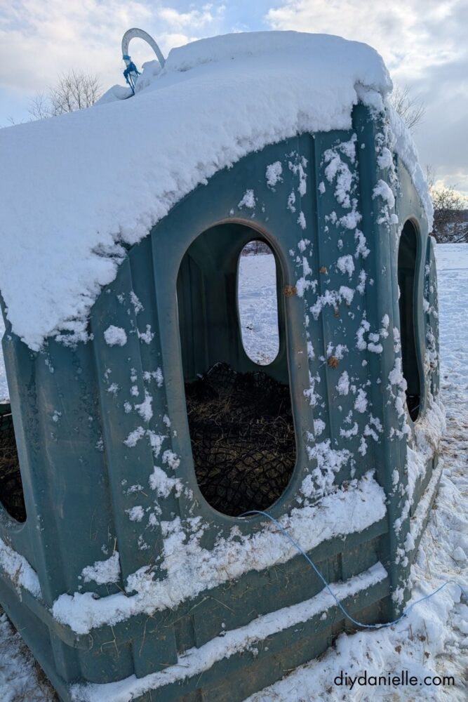Fully installed Hay Burners Equine Hay Hut net covering hay inside a Hay Hut, showing the completed setup for clean and efficient horse feeding.