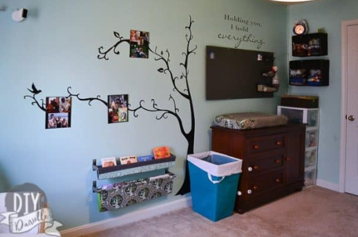 Tame Teal SW6757 nursery with Sherwin Williams Harmony Collection walls, coordinated lighting, wall art, and decor in a calm, stylish setup