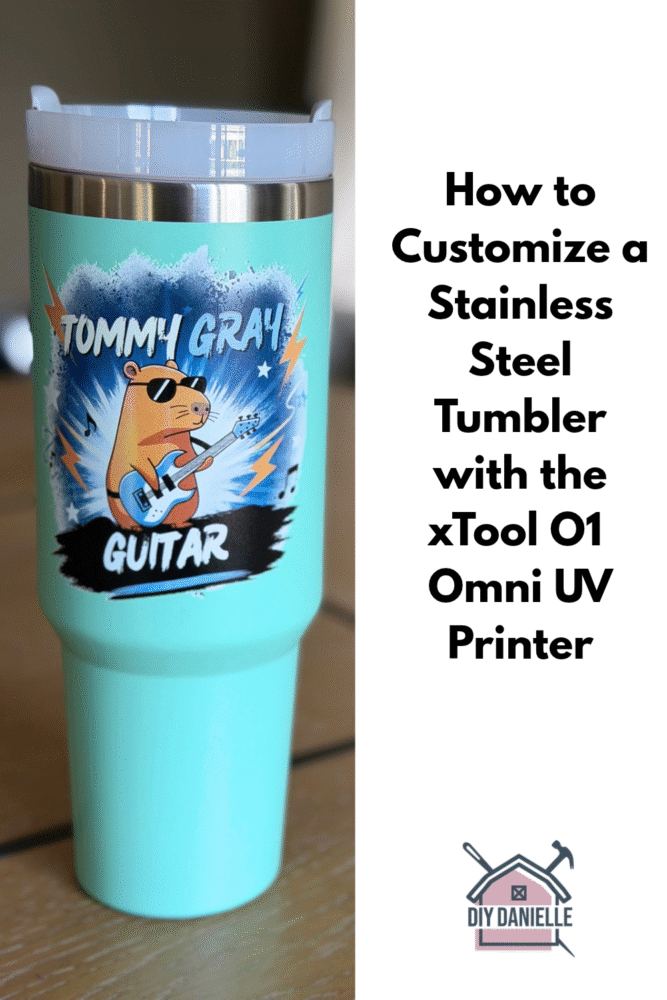 Image is divided in half with a picture on the left and a white area on the right. On the white area is the text: How to customize a stainless steel tumbler with the xTool O1 Omni UV Printer. 

On the left, the image is of a teal stainless steel cup with a musician's business name on it. There's a capybara with sunglasses playing a guitar and yellow lighting bolts, music notes in black, and white stars around it. 