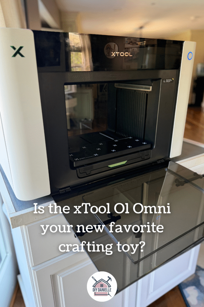 Photo of the O1 Dual Head Omni UV printer on a large rolling stand. The front is open.
Text says: Is the xTool O1 Omni your new favorite crafting toy?